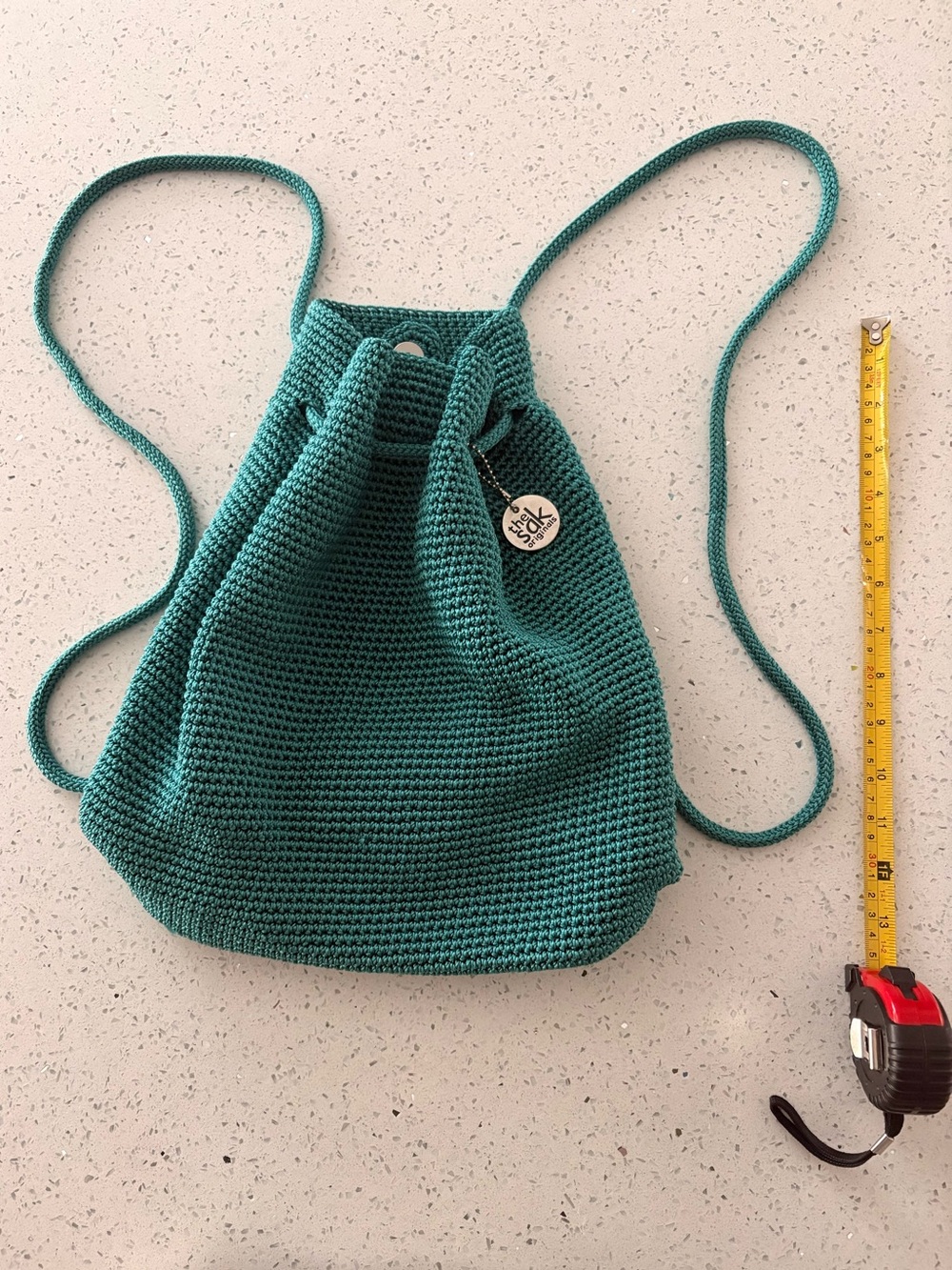 The Sak Teal Crochet Drawstring Backpack